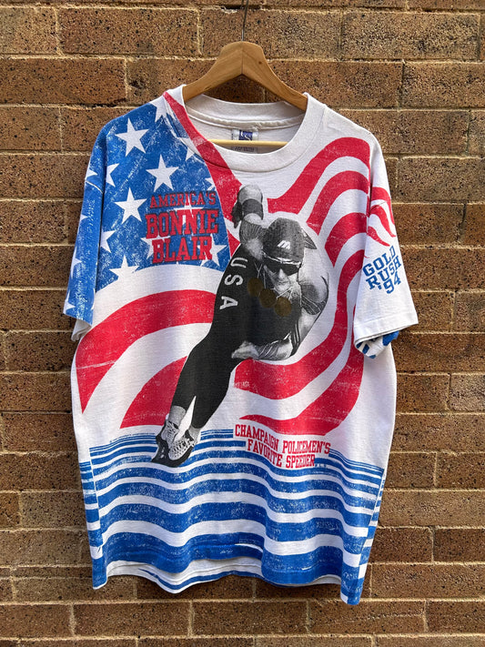 1994 USA Olympics Bonnie Blair Speed Skating AOP T-Shirt. Size L/XL